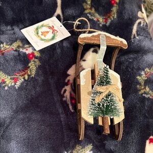 Charming Brown and Green Holiday Sled Ornament with Christmas tree & snow!
